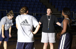 Kim Gervasoni with players, University of Nevada, 2003