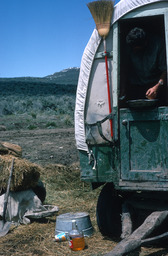 Herder inside camp wagon