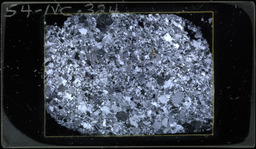 Thin section 54NC324, syenite aplite (polarized)