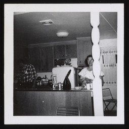 Patricia and Leland Sparks Jr. standing in a kitchen