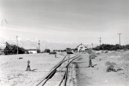 The Southern Pacific yard at Keeler viewed from the south with the depot at right and the town at left (1950)