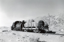 Southern Pacific Locomotive No. 9 with its auxiliary water tank (SP No. 54) between Owenyo and Keeler (1950)