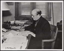 Dr. Church sitting in office, copy 1