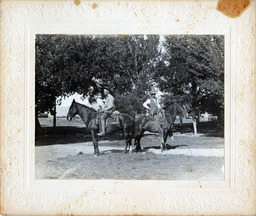 Two cowboys on horseback at Gerlach, Nevada