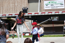 Young member of Winnemucca Irrintzi dancers receiving a medal at the 39th Annual Basque Festival in Winnemucca