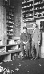 Store interior with two men