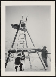 Dr. Church and colleague constructing wind charger support, copy 1 
