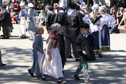 Young Basque dancers walking