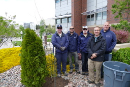 Gardeners posing with Tree of Gernika 