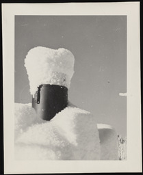 Cylindrical gauge covered with mound of snow, copy 2
