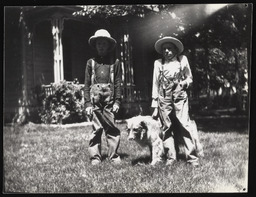 Charles Sparks with a friend and a dog