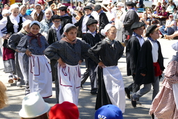 Young Basque dancers in procession after performance