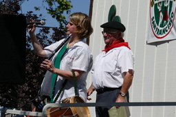 Valerie Etcharren Arretchea and Pierre Etcharren at podium