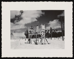 Snow monitoring station with worker and barn, copy 2