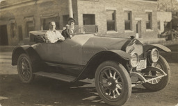 Two men in a National automobile