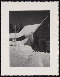 Large snowbank covering half of a building, copy 5