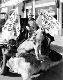 Girl on a float with a stuffed wolf advertising Nevada's exposition, Reno, Nevada, circa 1925