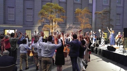 Musical performance with audience participation during Opening Ceremony