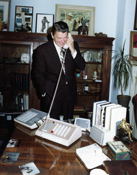 Photograph of Ronald Reagan using the phone, 1980