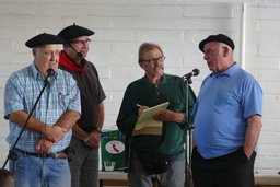 Four men singing