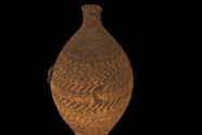 Water jar with spherical body, constricted neck, and conical base