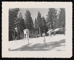 Monitoring station and snow poles with buildings