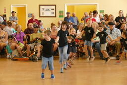 Children dancing and holding hands in chain at 2021 Reno Basque Festival