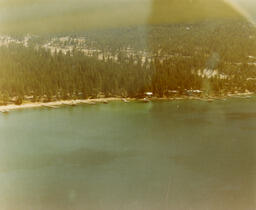 Lake Tahoe shoreline at Mill Creek aerial view, looking East, 1967