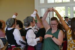 Basque dancers and attendees dancing with spins at 2021 Reno Basque Festival