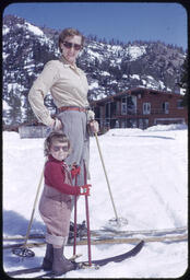 Edwina Antipa and young daughter in front of Squaw Valley lodge