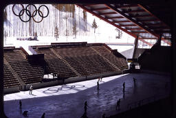 Olympic ice rink with skaters