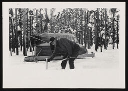 Taking snow core at Lewis Divide station