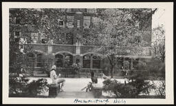 University of Michigan building and tennis court