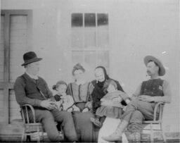 Photograph of a group on a porch