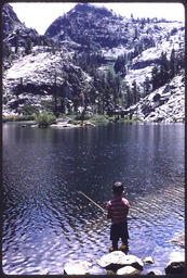 Boy fishing at Eagle Lake shore