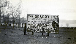 Sign advertising the Desert Inn, Pyramid Lake and Monte Cristo Dude Ranch