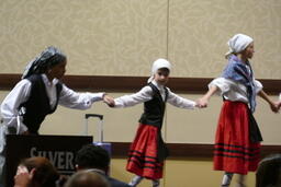 Dancers and children performing