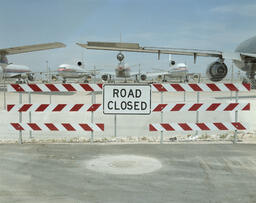Road Closed sign and mothballed airplanes, Las Vegas