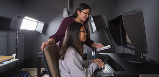 Team members working in the digitization lab.